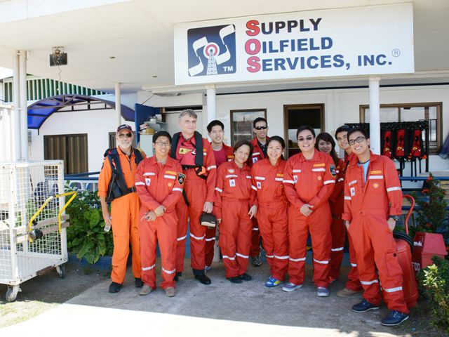 Shell employees accompany Bangko Sentral ng Pilipinas and Standard & Poor's officials to the Malampaya fly-by trip. In photo are [left to right] HNZ Captain Joseph Neill, Malampaya Project Accountant Jayjay Perlado, S&P Associate Director Agost Benard, BSP IRO Officer-in-Charge Editha L. Martin, BSP IRO Acting Bank Officer V Rica Amador, Shell Upstream Communications Manager Paulo Gavino, Malampaya Project Communications Advisor Christine Guison, SPEX Maintenance and Engineering Engineer Jericho Rivera and SPEX Maintenance and Engineering Engineer Raymond Gavino. 